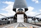 U.S. Airmen assigned to the 22nd Airlift Squadron, Travis Air Force Base, California, off-load a T6 container July 18, 2020, at Soto Cano Air Base, Honduras. The T6 container held 17,000 pounds of COVID-19 medical supplies for Honduras communities. (U.S. Air Force photo by Senior Airman Jonathon Carnell)