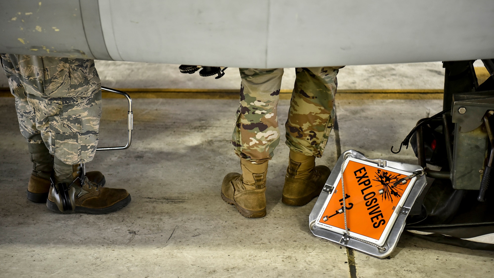 A photo of Airmen performing maintenance on aircraft.