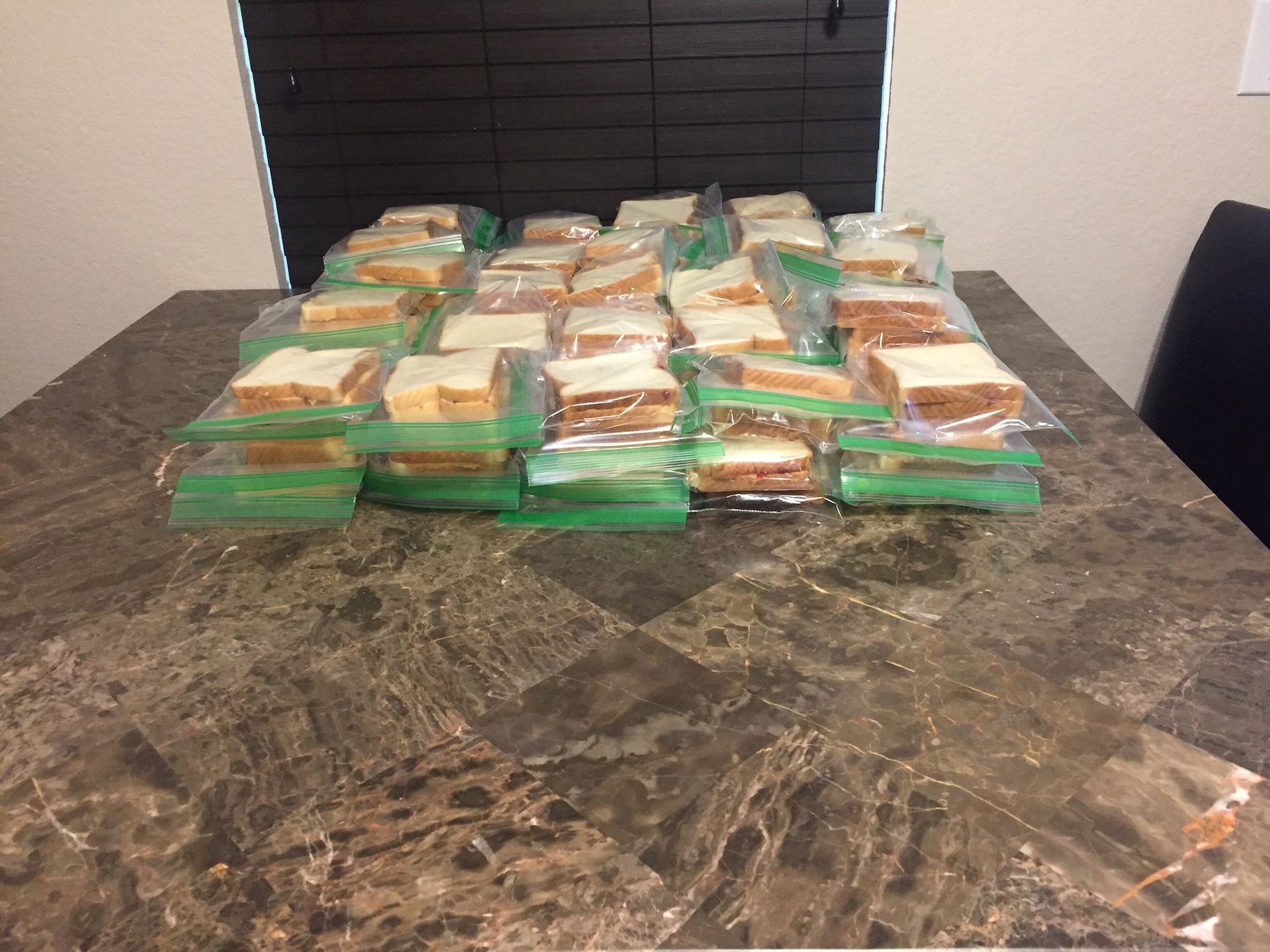 Reserve Citizen Airmen from the 23rd Intelligence Squadron donated more than 1,000 peanut butter and jelly sandwiches in the last month to local San Antonians in need.