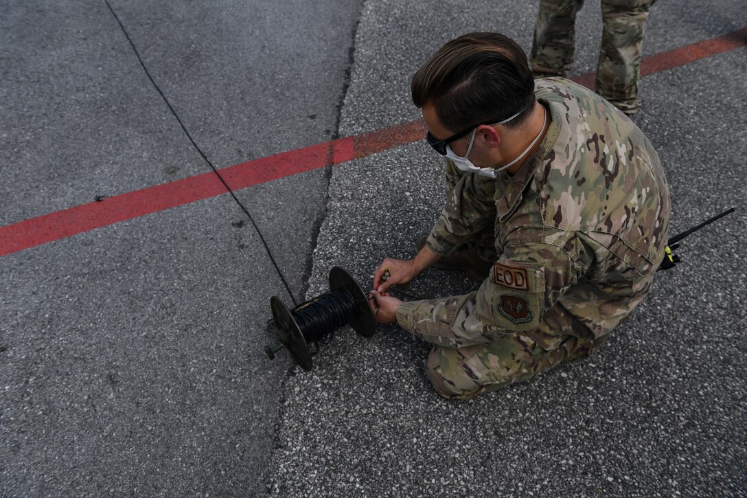 An Airman with the 31st Civil Engineer Squadron prepares to set off a block of C4 for training purposes at Aviano Air Base, Italy, July 15, 2020. EOD Airmen are often assigned to some of the most dangerous missions and perform tactically harrowing and technically demanding tasks in diverse environments worldwide. EOD Airmen also train monthly to ensure proper training requirements are met. (U.S. Air Force photo by Airman 1st Class Thomas S. Keisler IV)