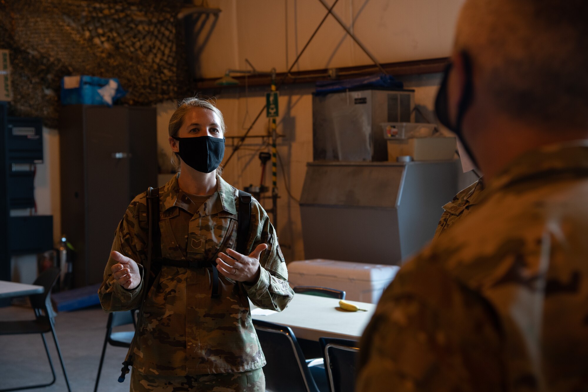 An Airmen explains the events of a recent military training exercise to 302nd Airlift Wing leadership.