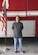 Connor Tabarini stands in front of a fire engine at the Idaho Air National Guard’s Gowen Field, after enlisting as a fireman in the Air Force Reserve.