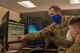 Staff Sgt. Wade Williams, left, 49th Comptroller Squadron special actions noncommissioned officer in charge, shows Staff Sgt. John Demko, 49th CPTS financial operations supervisor, how to navigate the new Comptroller Services Portal system, July 15, 2020, at the 49th CPTS on Holloman Air Force Base, N.M. Holloman members with ‘us.af.mil’ e-mail addresses can look forward to having items such as basic allowance for housing, hardship duty pay and clothing allowance taken care of through this new online program that begins July 27.  (U.S. Air Force photo by Senior Airman Collette Brooks)