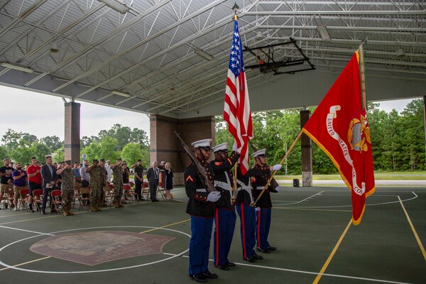 U.S. Marines with Wounded Warrior Battalion-East (WWBN-E) present colors during a retirement ceremony for Staff Sgt. Darron Dale at WWBN-E on Marine Corps Base Camp Lejeune, North Carolina, June 19, 2020. Dale, a Houston, Texas native, enlisted in 2006 and deployed six times during his Marine Corps career. Dale is set to retire June 29, 2020, with plans for employment with a federal agency or hospital administration. (U.S. Marine Corps photo by Cpl. Karina Lopezmata)