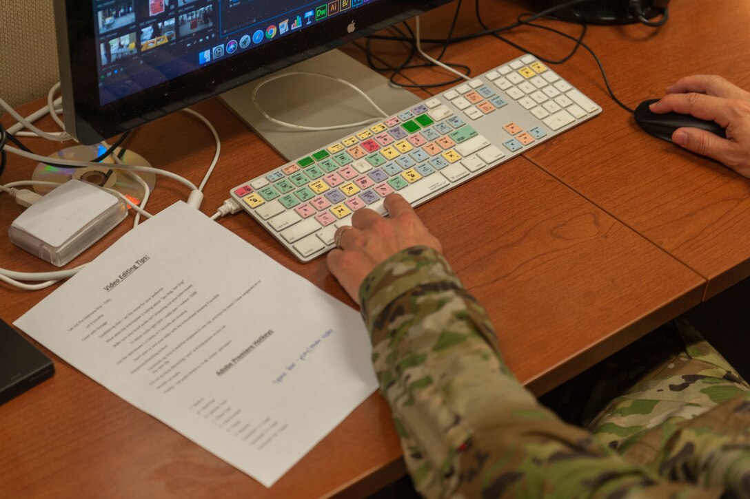 Photo of Chief Wilfong editing a video