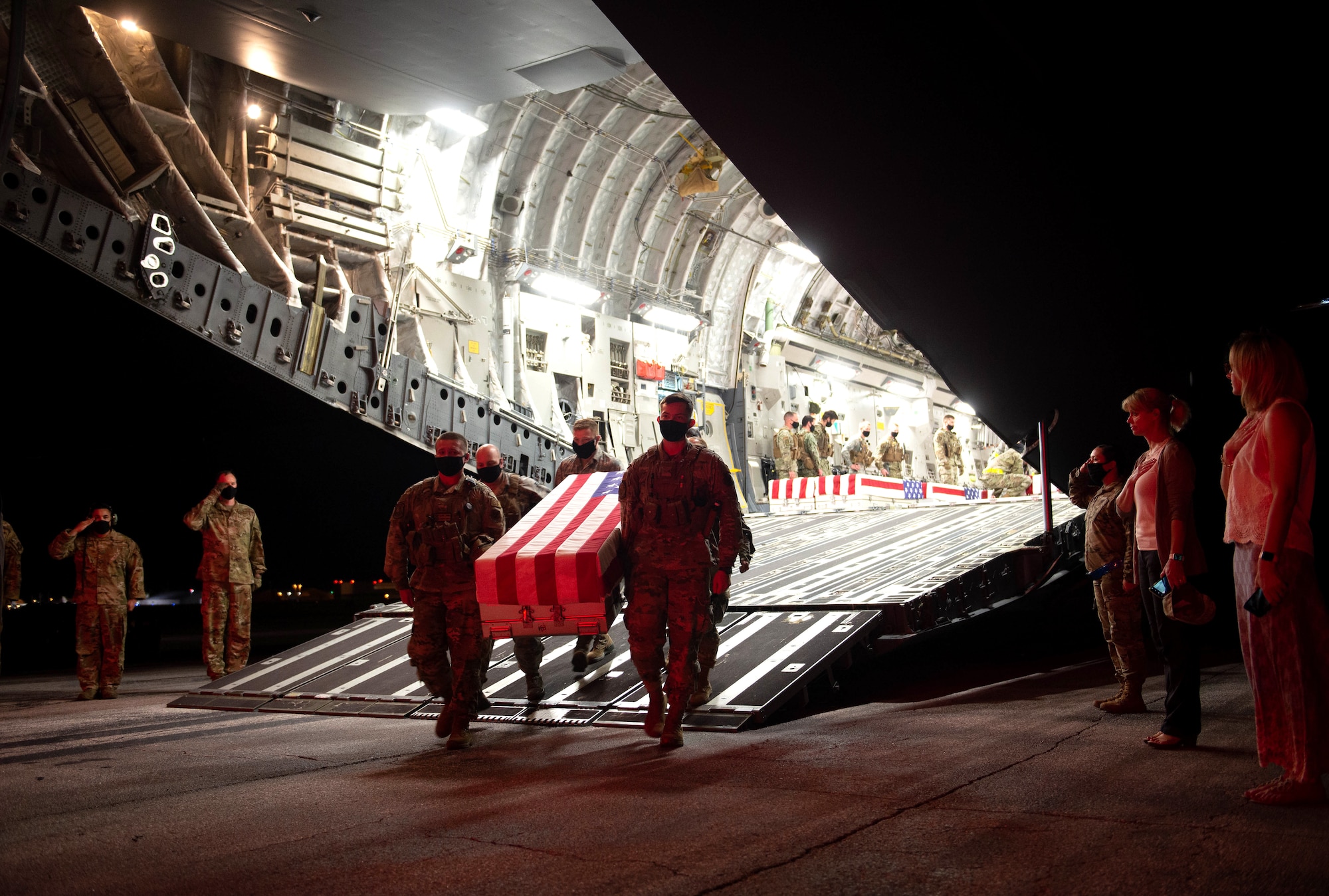 A photo of Team Offutt conducting a dignified transfer of remains