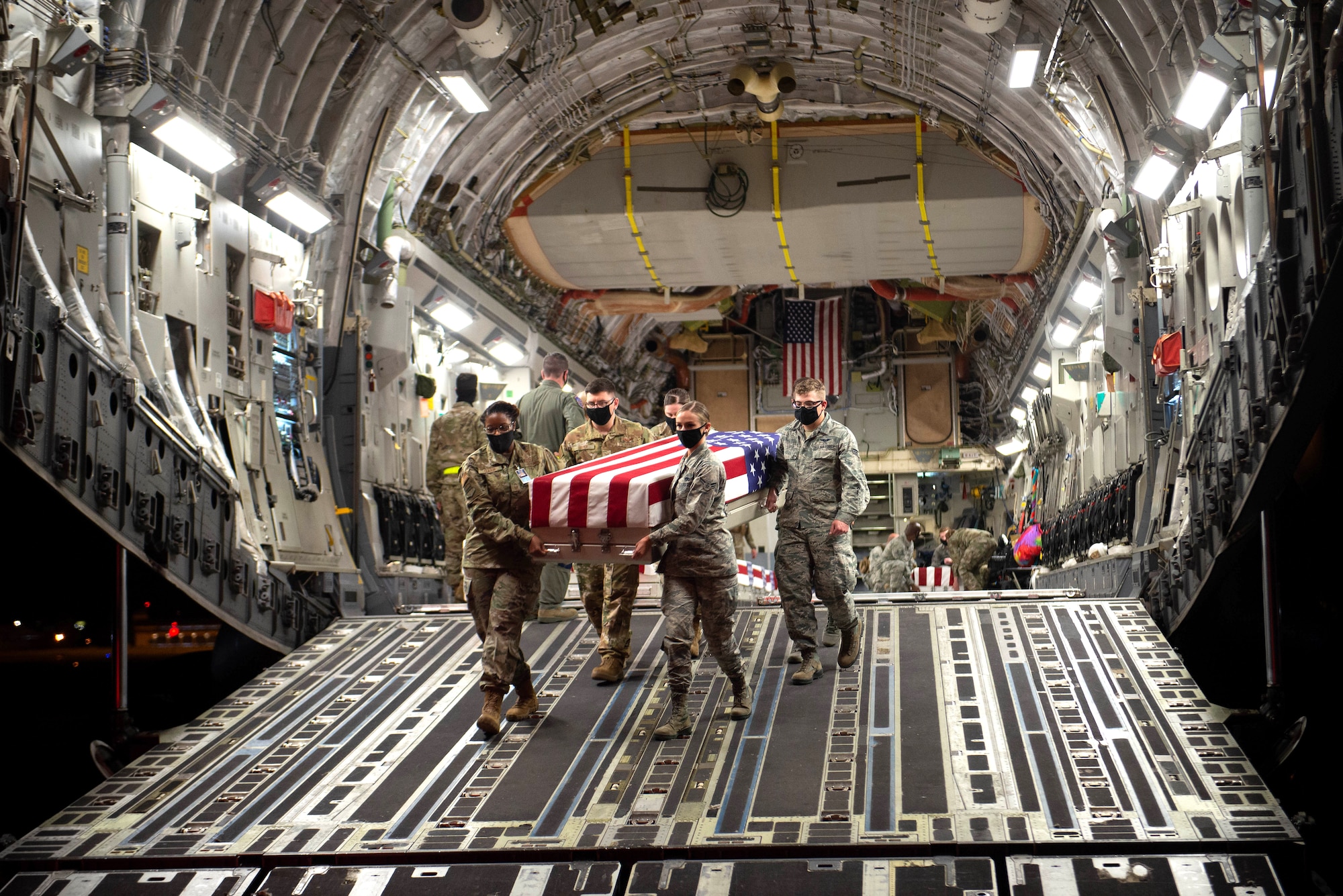 A photo of Team Offutt conducting a dignified transfer of remains