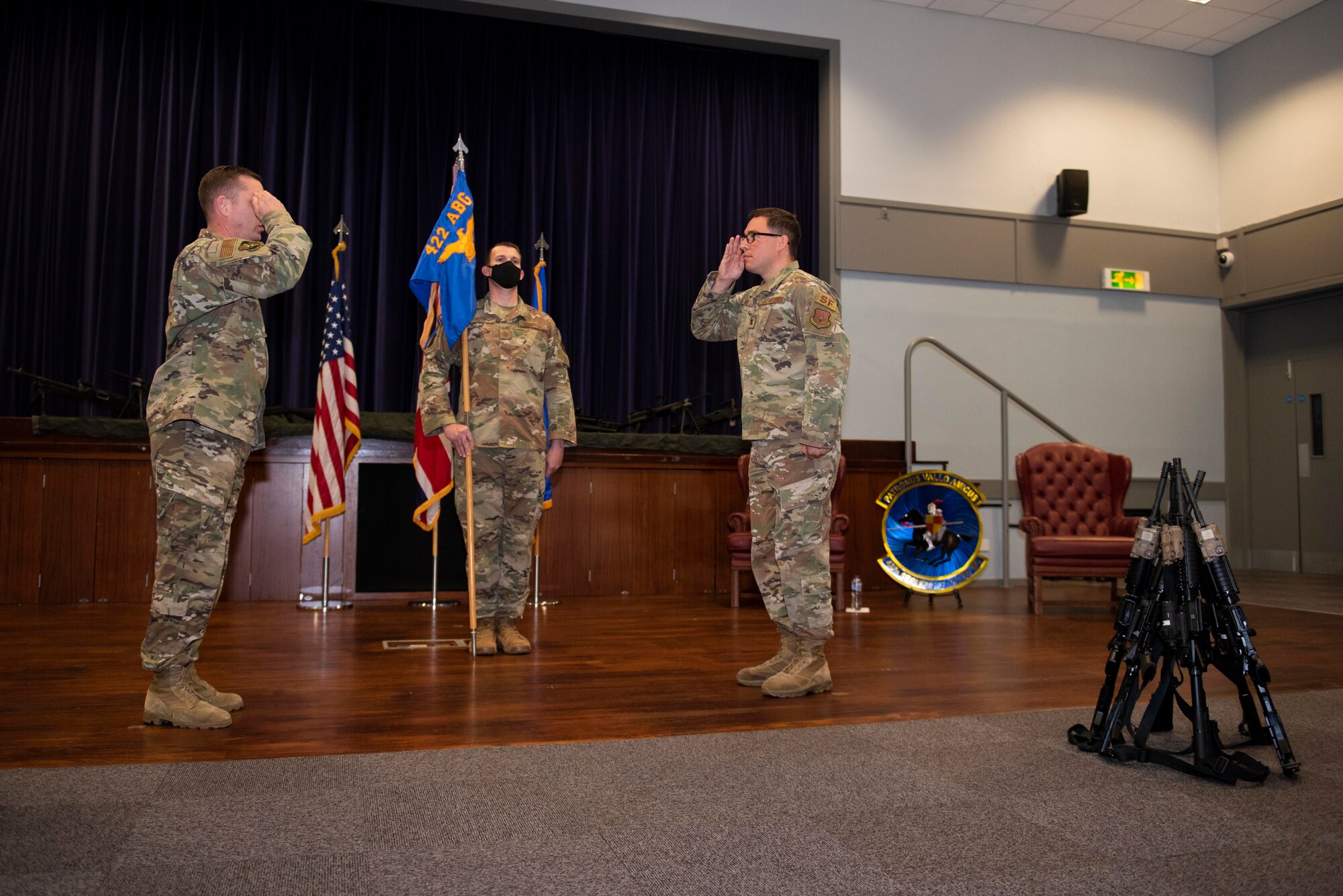 U.S. Air Force Col. Jon Hannah, left, 422nd Air Base Group commander, and Maj. Thomas Uhl, right, 422nd Security Forces Squadron (SFS) Incoming commander, salute during the 422nd SFS Assumption of Command ceremony at RAF Croughton, England, July 22, 2020. The change of command ceremony is rooted in military history dating back to the 18th century representing the relinquishing of power from one officer to another. (U.S. Air Force photo by Airman 1st Class Jennifer Zima)