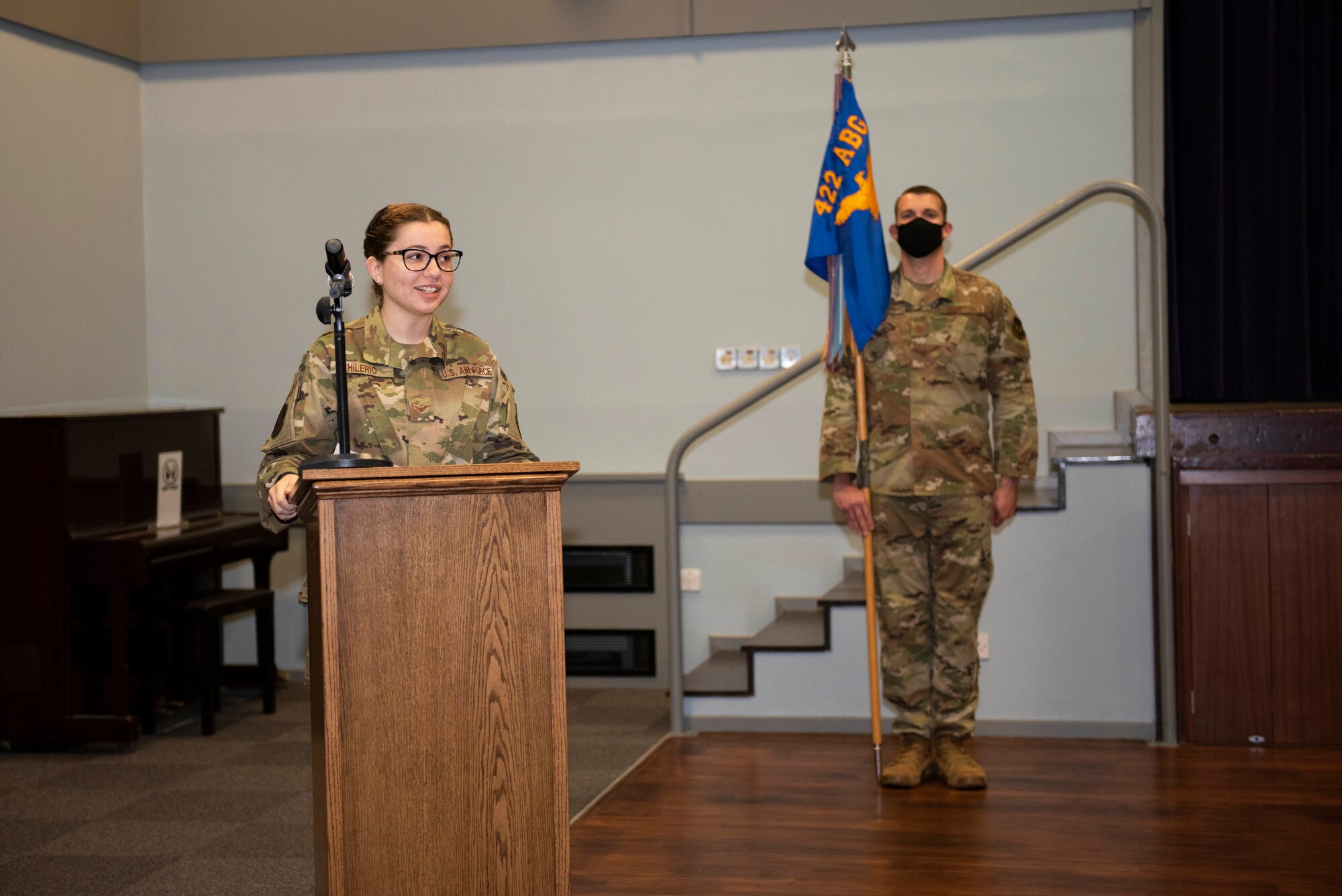 U.S. Air Force Airman 1st Class Laurie Hilerio, 422nd Security Forces Squadron (SFS) entry controller, narrates during the 422nd SFS Assumption of Command ceremony at RAF Croughton, England, July 22, 2020. The change of command ceremony is rooted in military history dating back to the 18th century representing the relinquishing of power from one officer to another. (U.S. Air Force photo by Airman 1st Class Jennifer Zima)