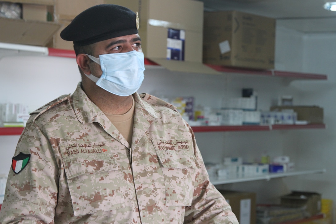 Kuwaiti Col. Raed Altajalli speaks with U.S. Army Soldiers of the 3rd Medical Command on in a quarantine facility, Kuwait, July 3rd, 2020. U.S. and Kuwaiti forces have been working together to stop the spread of COVID-19 in Kuwait. (U.S. Army photo by Sgt. Andrew Valenza)