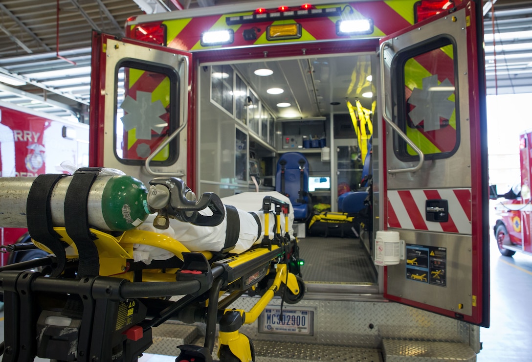 A stretcher is pulled out of an ambulance with the Cherry Point Fire and Emergency Services, at Marine Corps Air Station Cherry Point, N.C., June 29.