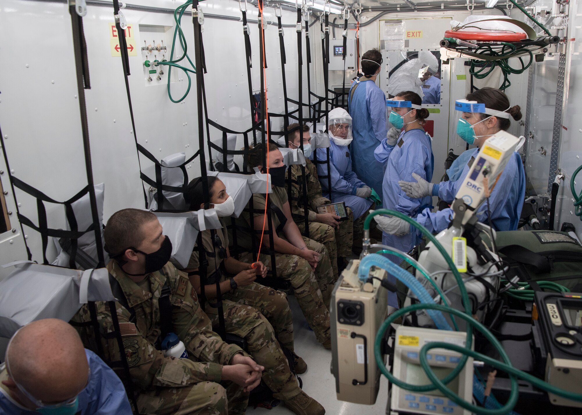 Image of Airmen participating in training scenarios inside a Negatively Pressurized Conex at Ramstein Air Base.