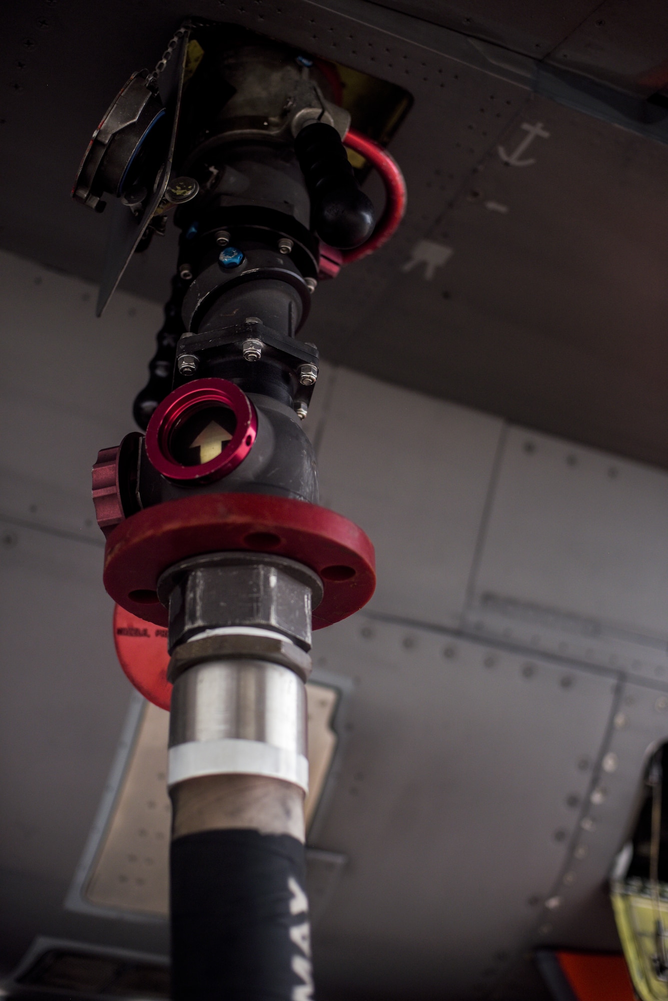 Pictured is a 325th Logistics Readiness Squadron petroleum, oils and lubricates fueling hose at Tyndall Air Force Base, Florida, July 9, 2020. There are many moving pieces to operational flight line success that rely on multi-faceted agencies, such as LRS’s POL Airmen, supported by uniformed service members, governments service employees and contracted civilians. (U.S. Air Force photo by Staff Sgt. Magen M. Reeves)