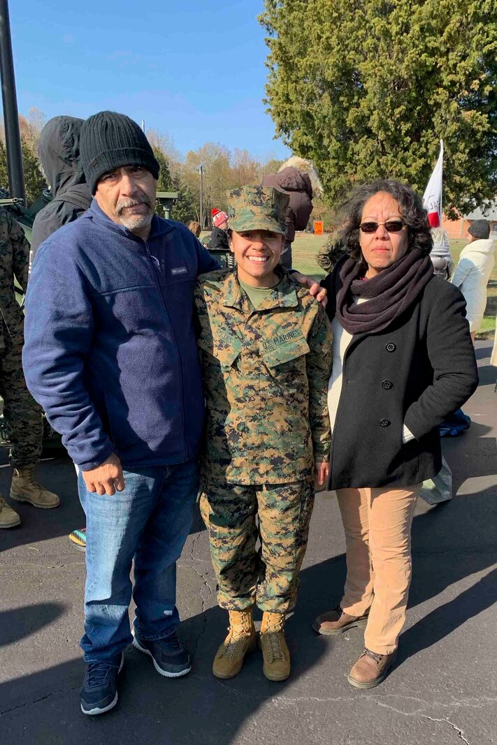 2nd Lieutenant Esmeralda Rojas poses with her parents after being commissioned, November 16, 2019, at Marine Corps Officer Candidates School in Quantico, Virginia. Rojas was given a second chance at Officer Candidates School to earn the title and commission as a second lieutenant in the Marine Corps. (Courtesy Photo)