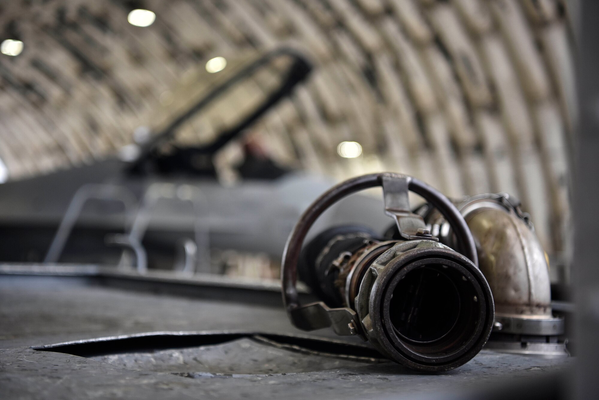 A photo of a ground power unit in front of an aircraft.