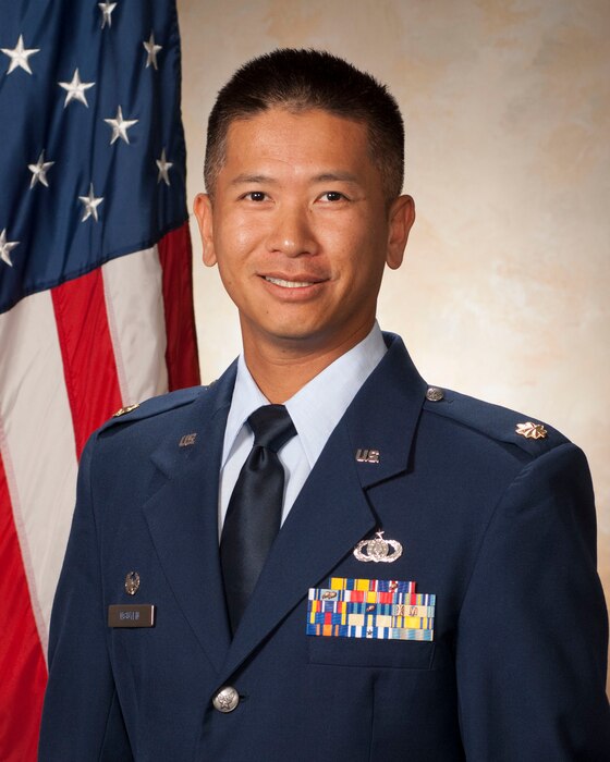 Official portrait of the Commander of the 562nd Air National Guard Band of the West Coast, Maj. Vu Nguyen.