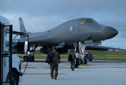 Aircrew, assigned to the 37th Expeditionary Bomb Squadron, prepare to board a B-1B Lancer at Andersen Air Force Base, Guam, prior to a Bomber Task Force mission in the South China Sea, July 21, 2020. Long range, long duration missions demonstrate the U.S. Air Force’s unwavering commitment to our allies and partners in the Indo-Pacific region. (U.S. Air Force Photo by Airman 1st Class Christina Bennett)
