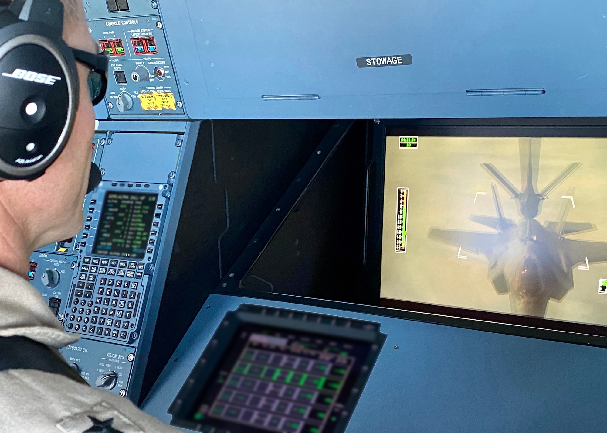 Brig. Gen. Larry Broadwell, 380th Air Expeditionary Wing commander, views the refueling of an F-35A Lightning II on Wednesday, July 15, 2020 over Southwest Asia. U.S. and coalition partnerships are vital to ensuring deterrence and stability of the region. (U.S. Air Force photo by Tech. Sgt. Melissa Harvey) (This photo has been altered for security purposes by blurring screens.)