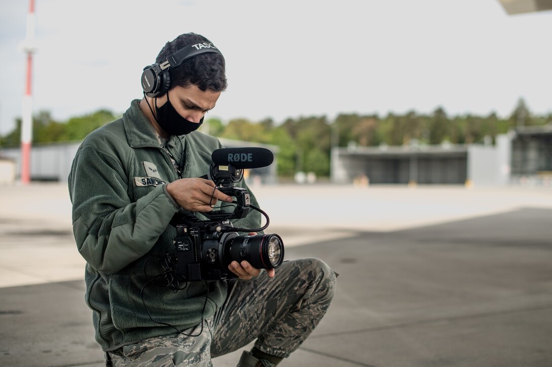 Photo of Airman performing magic