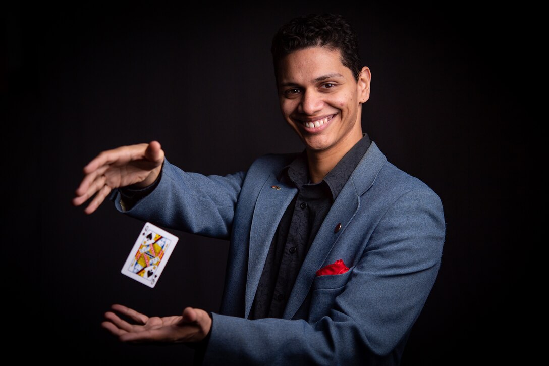 Photo of Airman performing magic