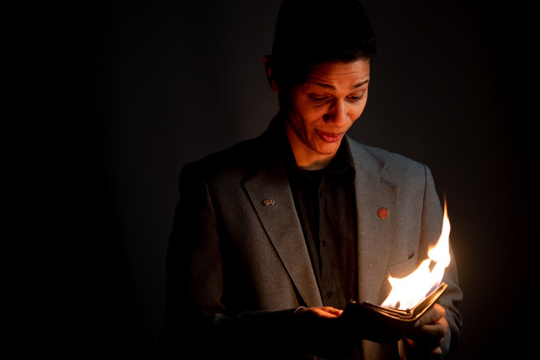 Photo of Airman performing magic