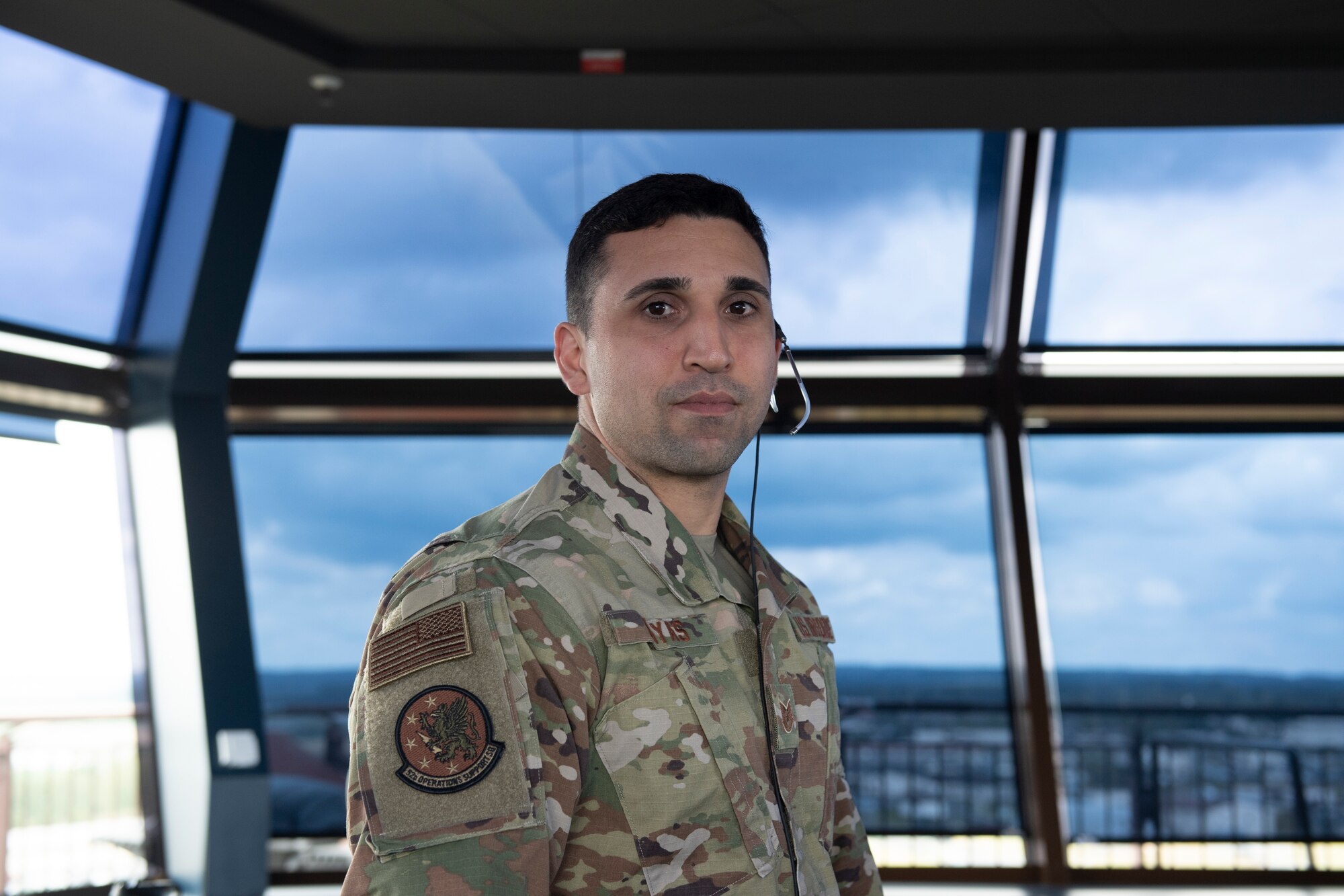 U.S. Air Force Tech. Sgt. Erron Sayas, 52nd Operational Support Squadron air traffic control watch supervisor, poses for a photo at Spangdahlem Air Base, Germany, July 17, 2020. Sayas is credited for preventing a disaster on the flightline between a C-17 Globemaster III aircraft and a flightline sweeper vehicle. (U.S. Air Force photo by Airman 1st Class Alison Stewart)