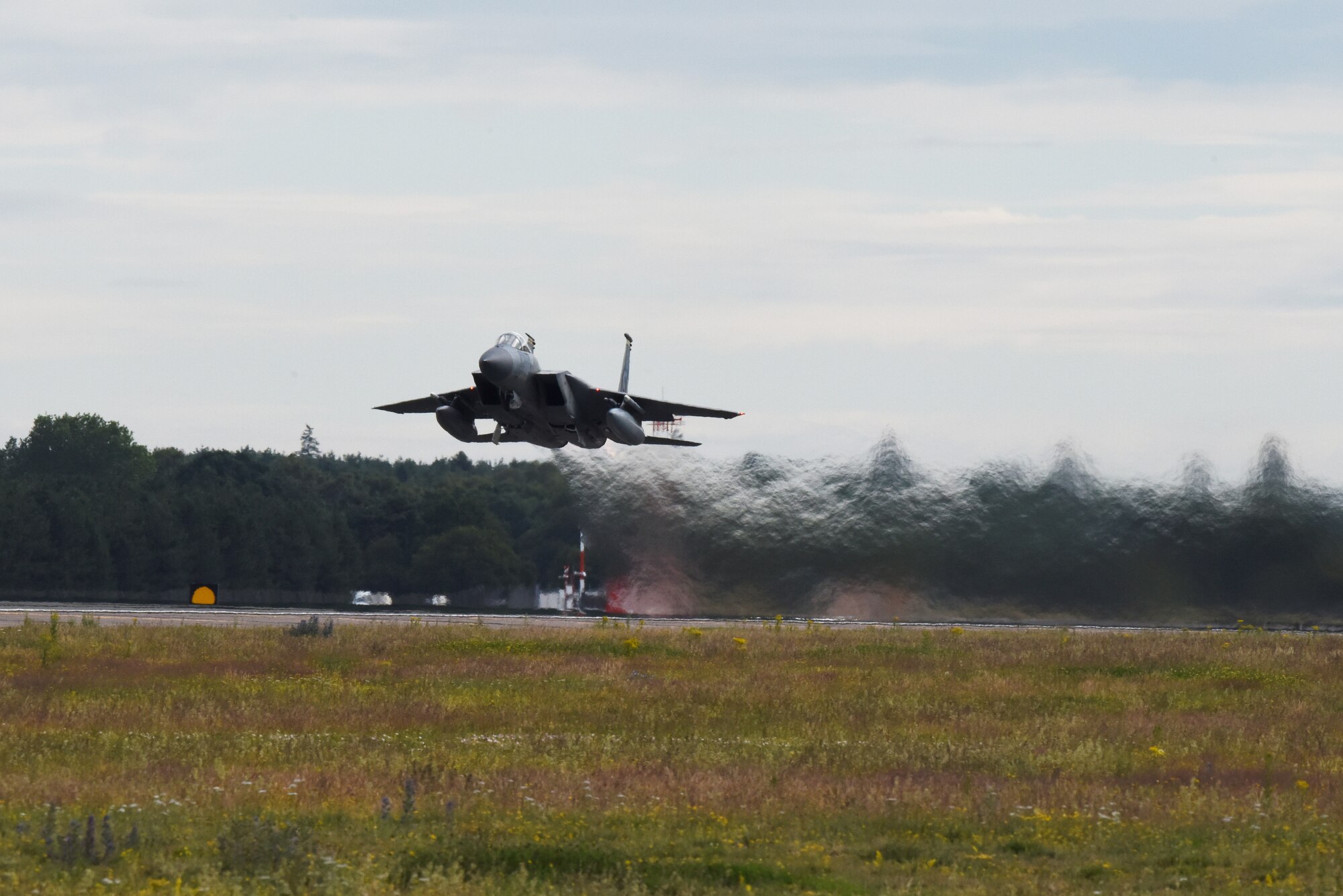 An F-15C Eagle assigned to the 493rd Fighter Squadron takes off at Royal Air Force Lakenheath, England, July 23, 2020. The F-15C is an all-weather, extremely maneuverable, tactical fighter designed to permit the U.S. Air Force to gain and maintain air supremacy over the battlefield. (U.S. Air Force photo by Airman 1st Class Rhonda Smith)