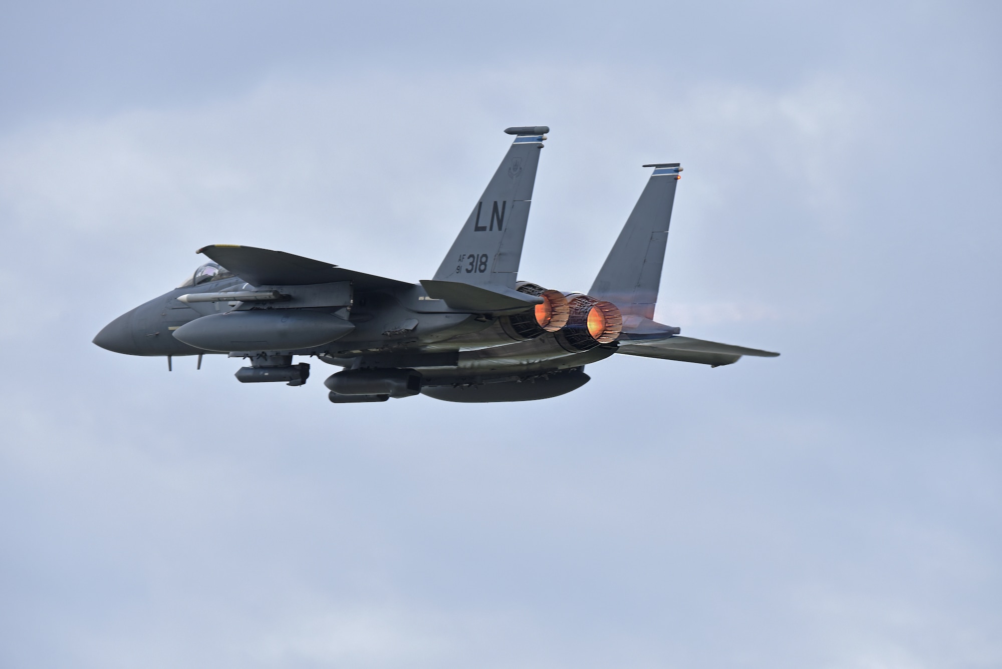 An F-15E Strike Eagle assigned to the 492nd Fighter Squadron takes off at Royal Air Force Lakenheath, England, July 23, 2020. To maintain proficiency, Liberty Wing aircrew perform daily training missions ensuring they are always ready to provide worldwide responsive combat airpower. (U.S. Air Force photo by Airman 1st Class Rhonda Smith)