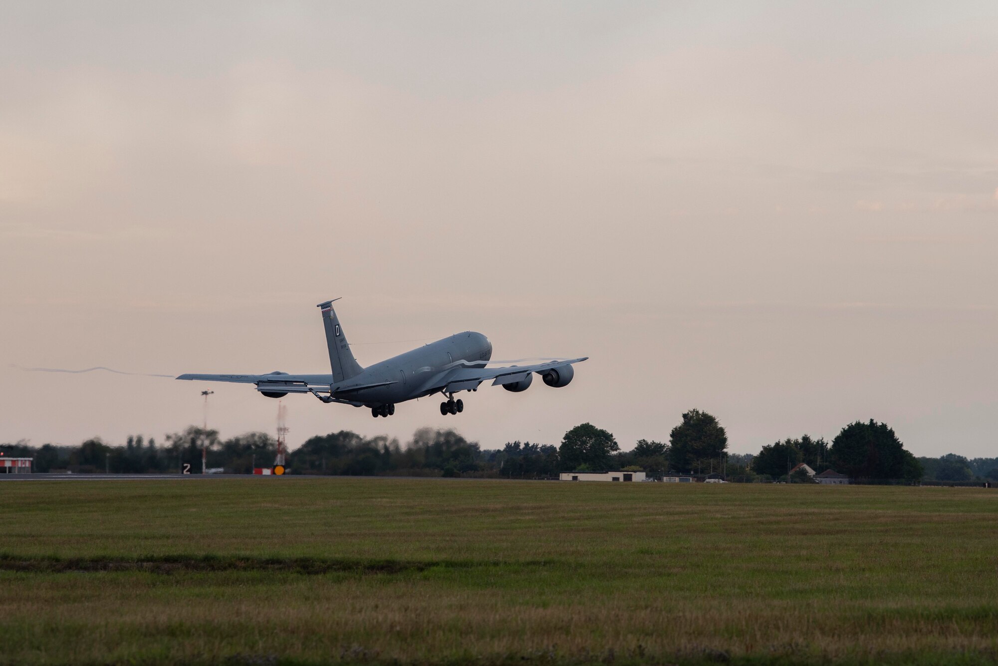 A KC-135 Stratotanker aircraft assigned to the 100th Air Refueling Wing takes off from RAF Mildenhall, England, July 22, 2020. The aircraft integrated with Air Force and Navy assets over the Black Sea, demonstrating U.S. forces’ commitment to allies and partners in the region. (U.S. Air Force photo by Airman 1st Class Joseph Barron)