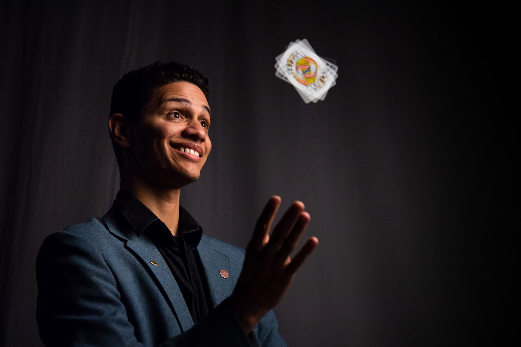 Photo of Airman performing magic