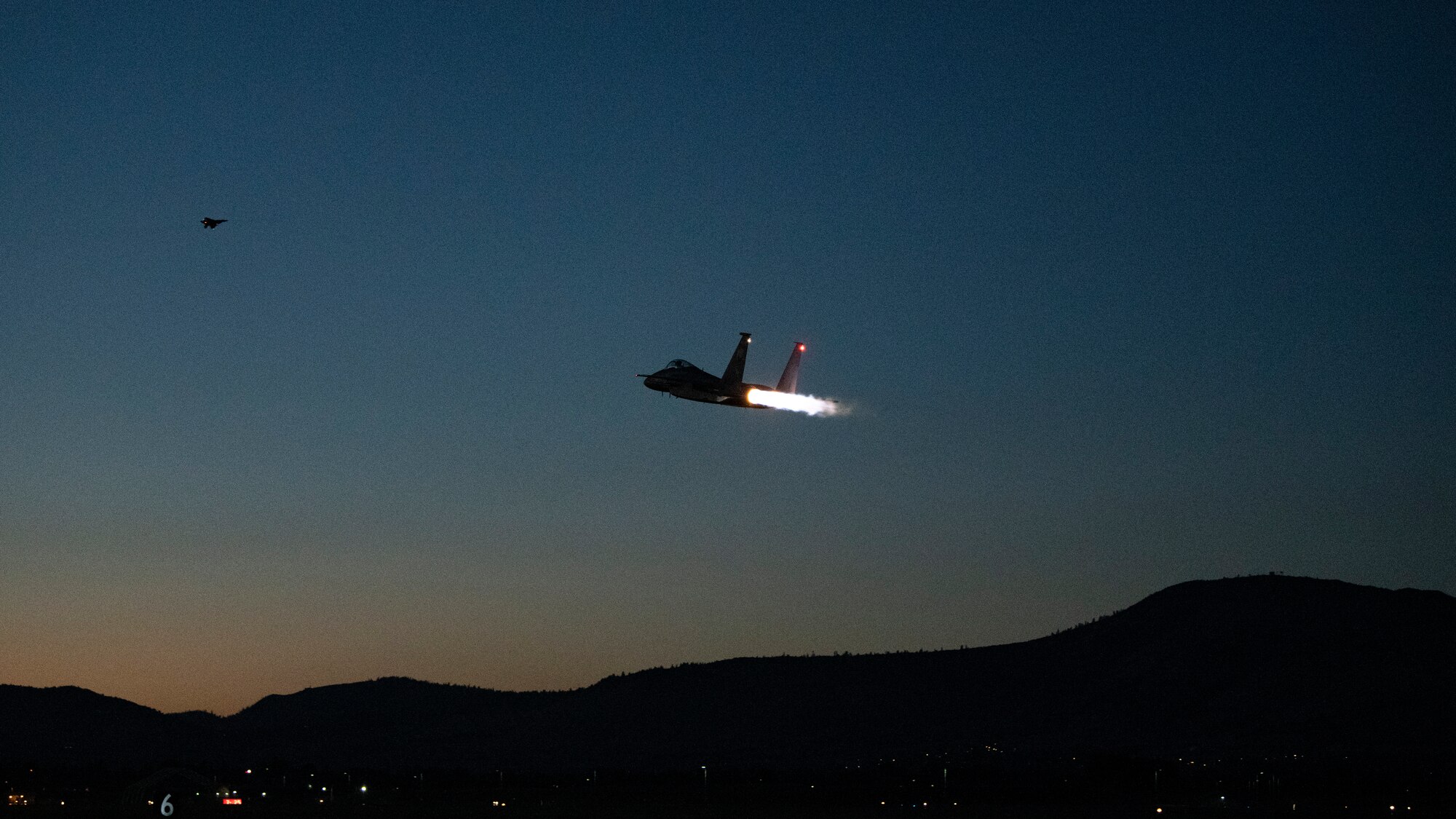 Fighter Jet conducts night flight operations