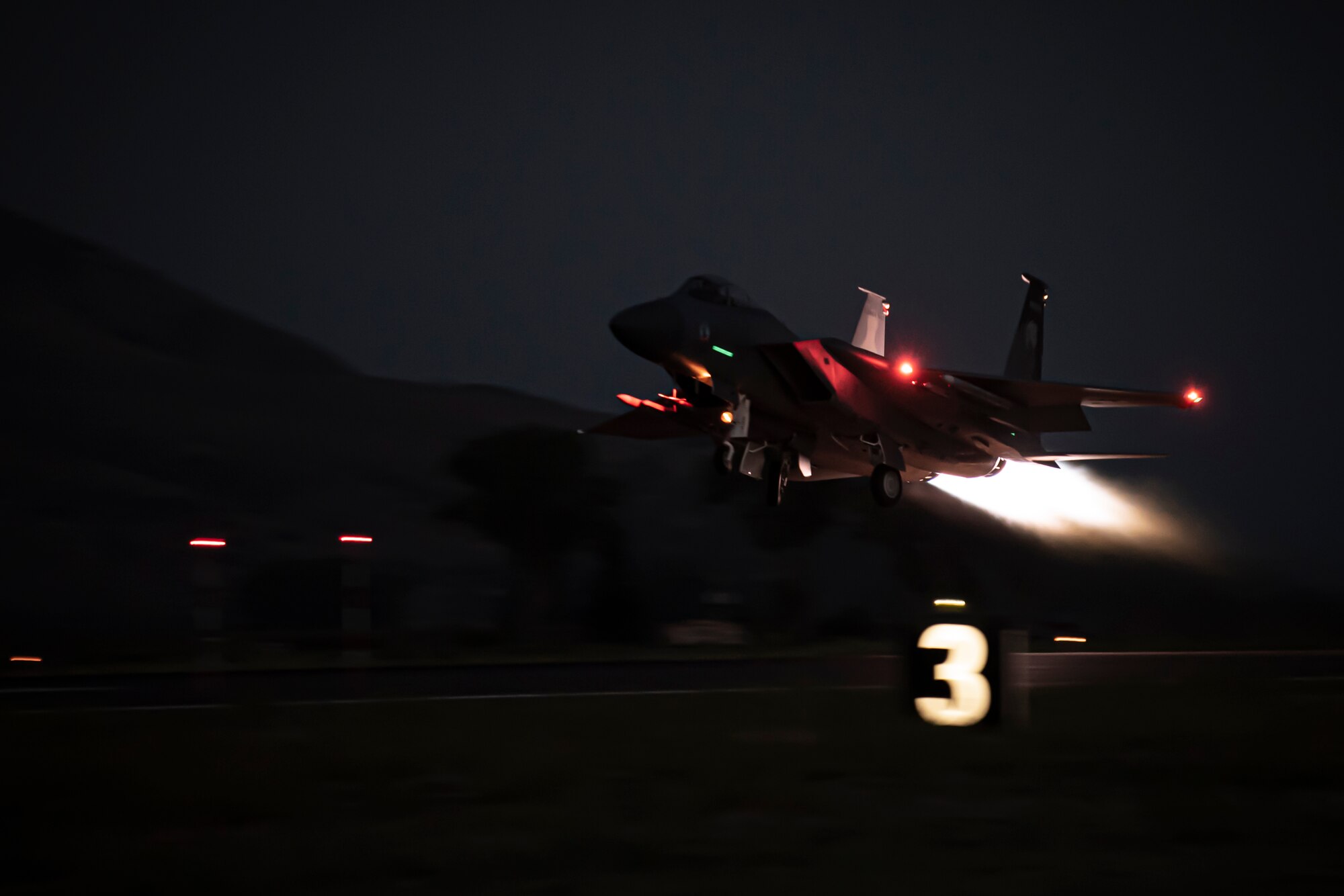 Fighter Jet conducts night flight operations