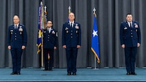 Maj. Gen. Mark E. Weatherington, 8th Air Force and Joint-Global Strike Operations Center commander, Col. Michael A. Miller, outgoing 2nd Bomb Wing commander, and Col. Mark C. Dmytryszyn, incoming 2nd BW commander, stand at the position of attention during a change of command ceremony at Barksdale Air Force Base, La., July 23, 2020. A change of command is a military tradition that represents a formal transfer of authority and responsibility for a unit from one commanding or flag officer to another. (U.S. Air Force photo by Airman 1st Class Jacob B. Wrightsman)