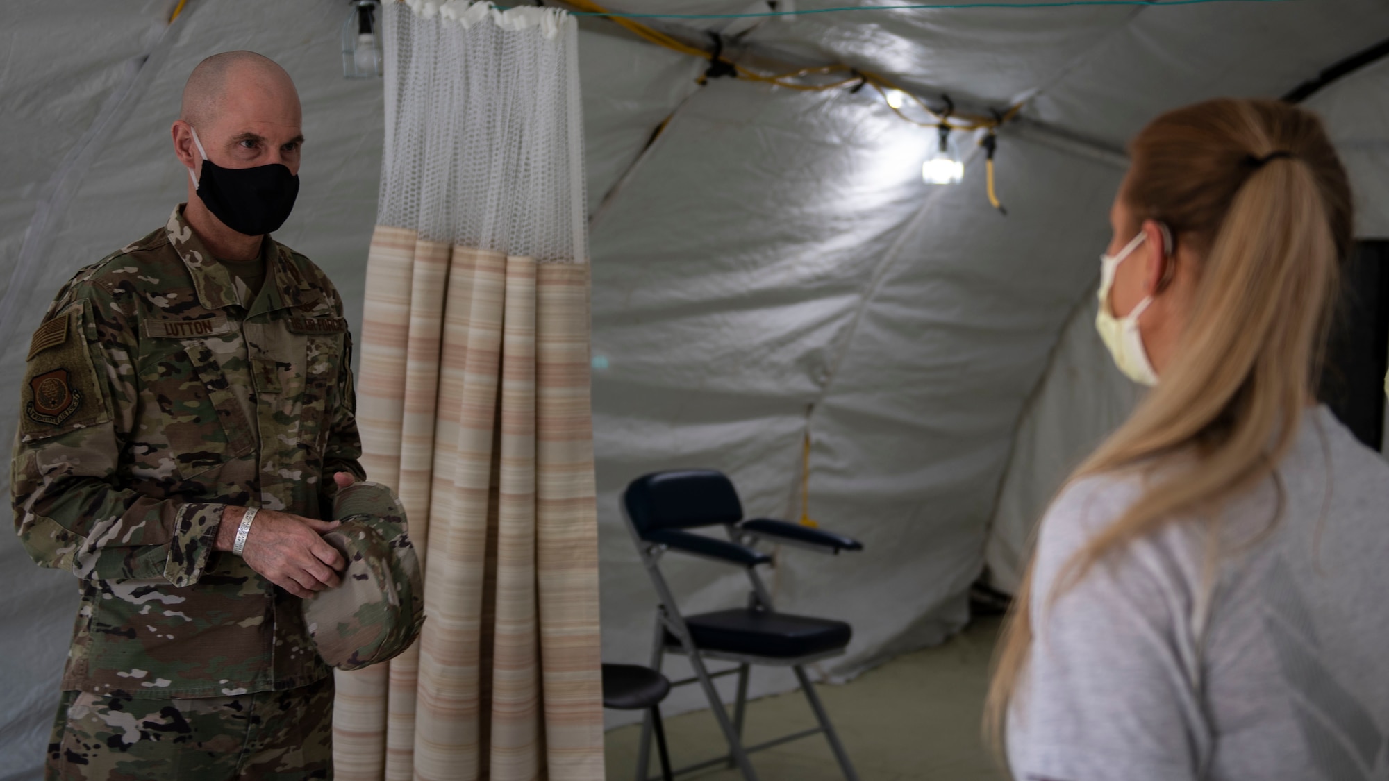 U.S. Air Force Maj. Gen. Michael J. Lutton 20th Air Force commander, speaks with an Airman.