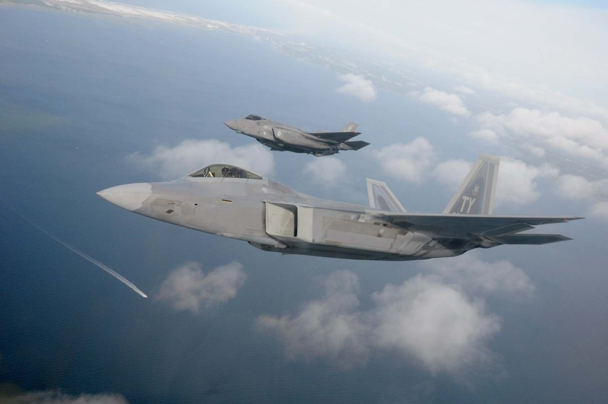 Manned aircraft, such as this F-22 Raptor or F-35 Lightning II, could one day operate with autonomous attritable unmanned aircraft acting as wingmen. The award of the Skyborg Prototyping, Experimentation and Autonomy Development indefinite-delivery/indefinite-quantity contract sets the stage to begin prototyping and operational experimentation for the Skyborg Vanguard program. (U.S. Air Force photo/1st Lt. Savanah Bray)