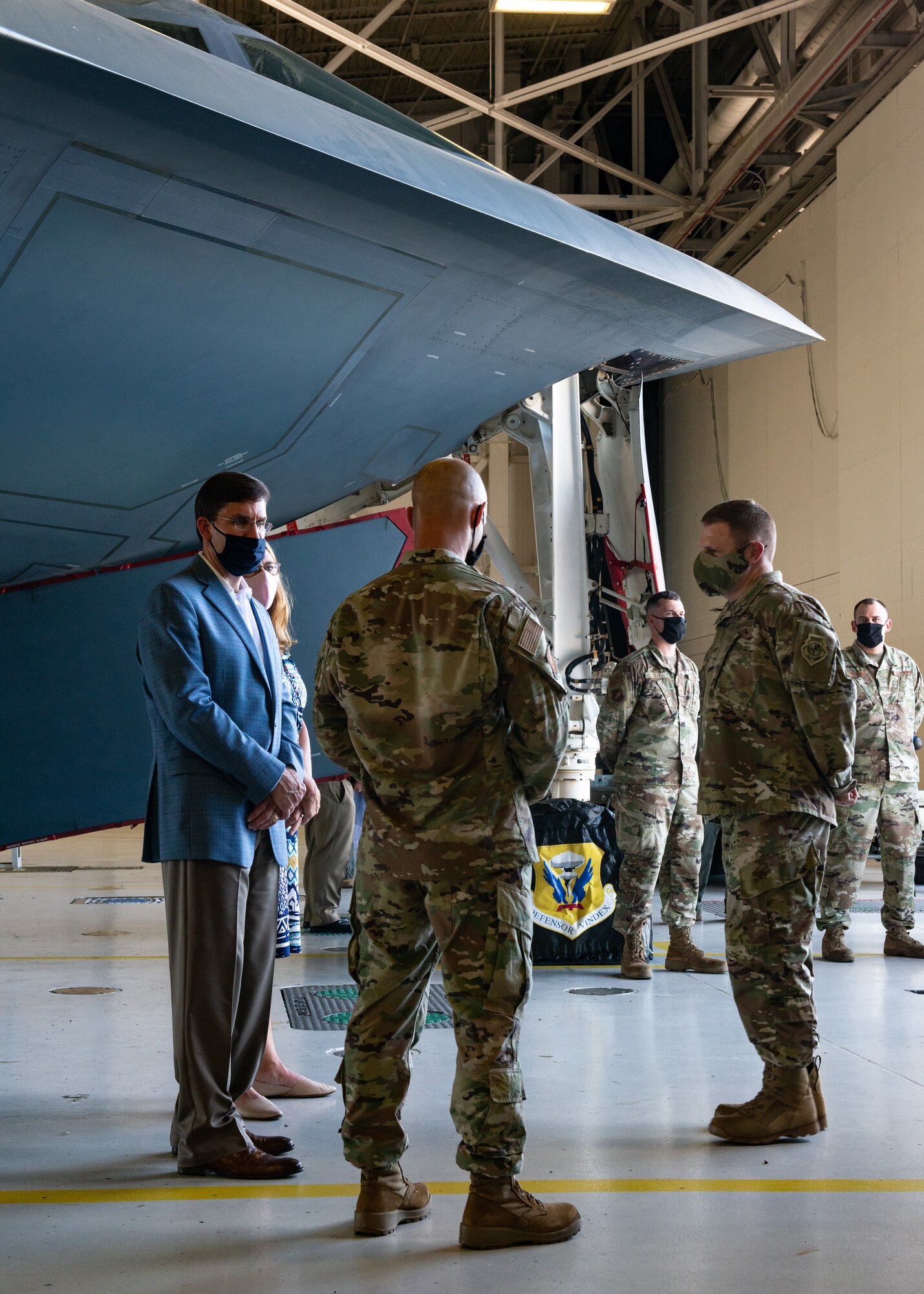 U.S. Secretary of Defense Dr. Mark T. Esper  speaks with 509th and 131st Bomb Wing maintainers during a visit at Whiteman Air Force Base, Missouri, July 22, 2020. During his visit Esper received an in-person introduction to various aspects of Team Whiteman's mission, total-force integration with its Air National Guard partner unit and maintenance of B-2 Spirit combat readiness during COVID-19. Esper met with Airmen to discuss diversity and inclusion in the ranks — as he has done at DOD installations around the world in the last month. (U.S. Air Force photo by Senior Airman Thomas Barley)