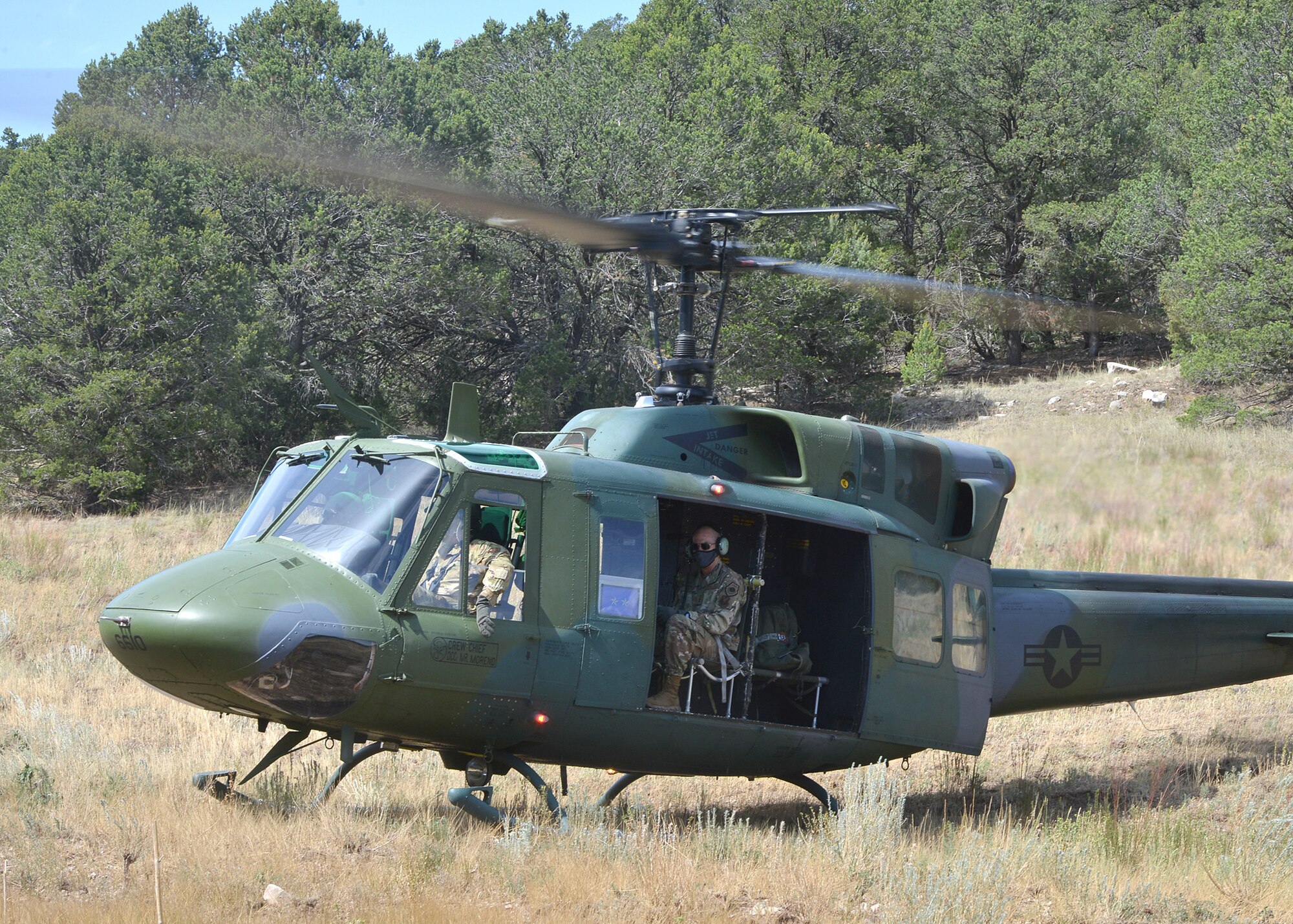 U.S. Air Force Maj. Gen. Michael J. Lutton 20th Air Force commander, is transported  in a UH-1N Huey.