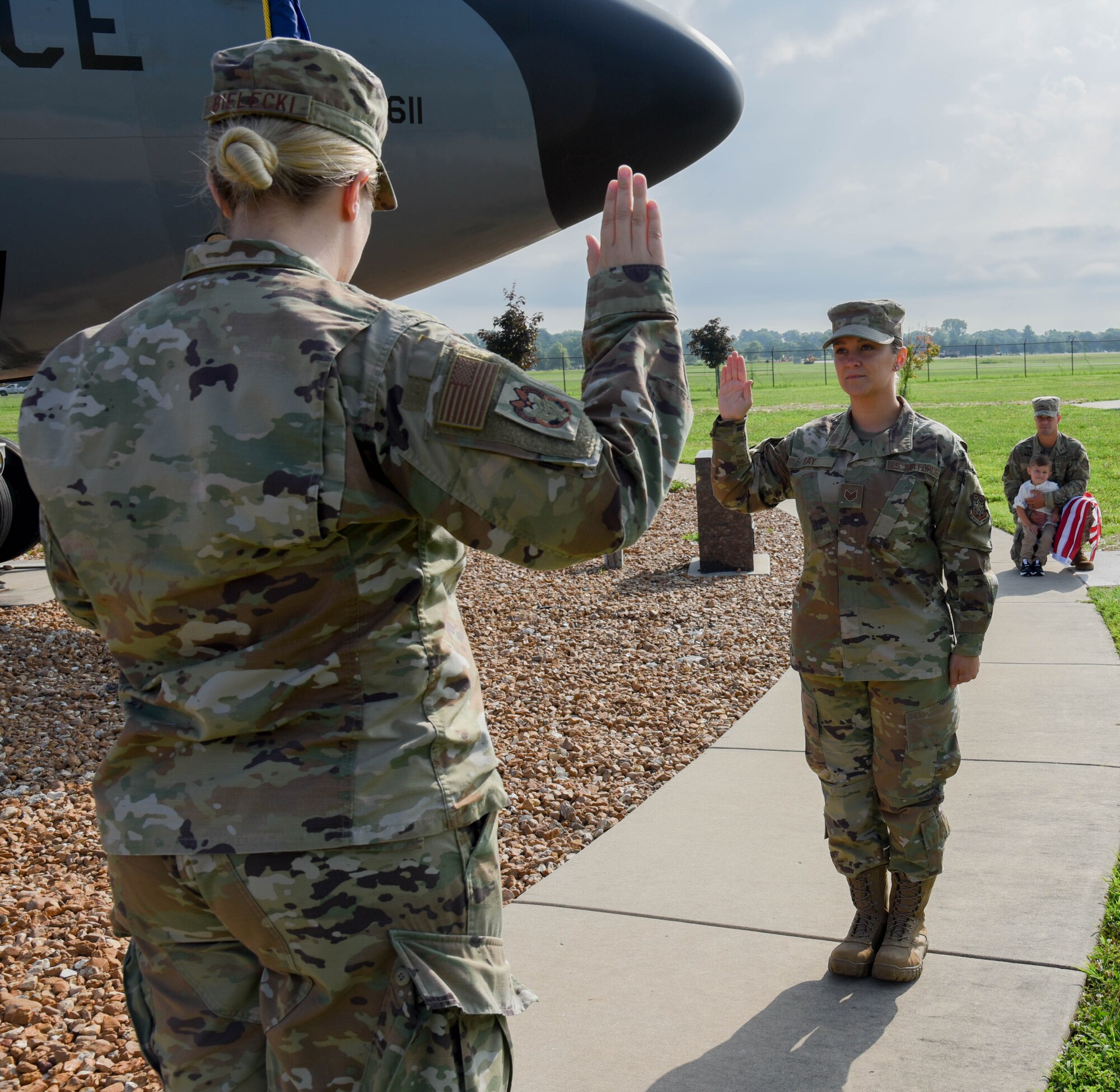 Capt Morgan Bielecki re-enlisting Staff Sgt. Taylor Ray.