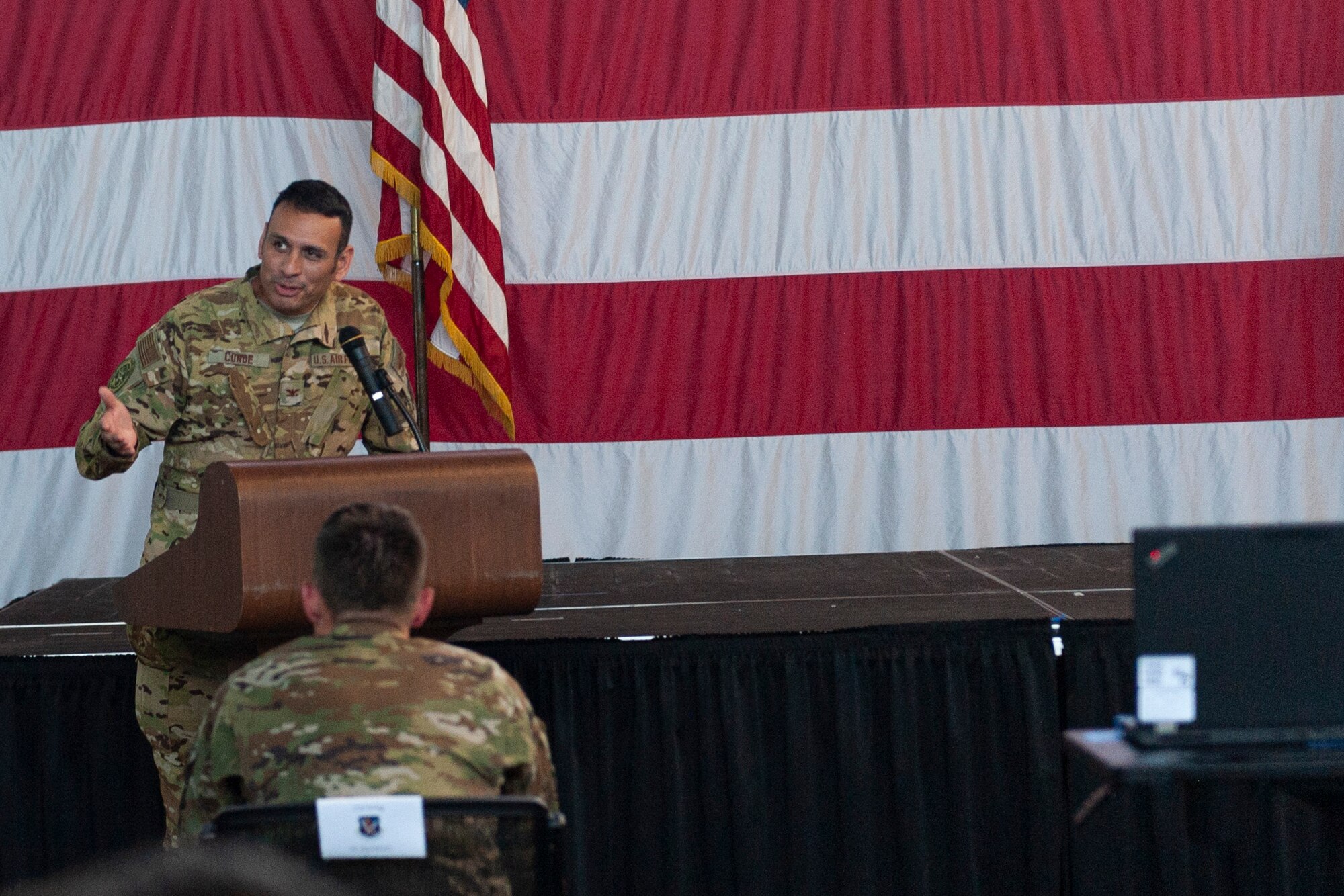 Photo of Col. Conde making remarks