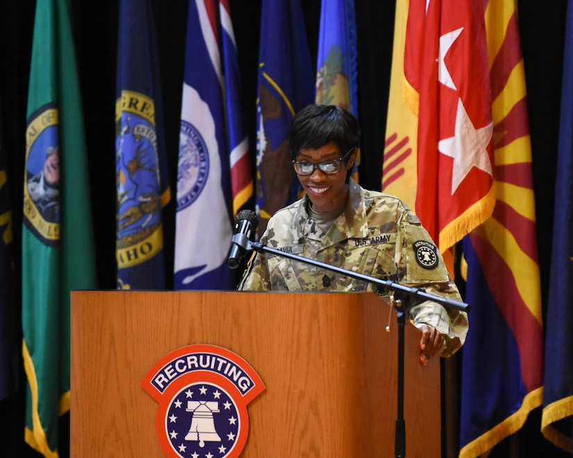 a female soldier giving a speech.