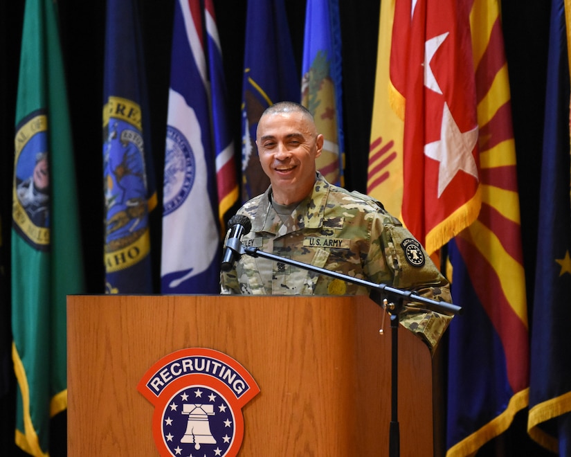 a male soldier gives a speech.