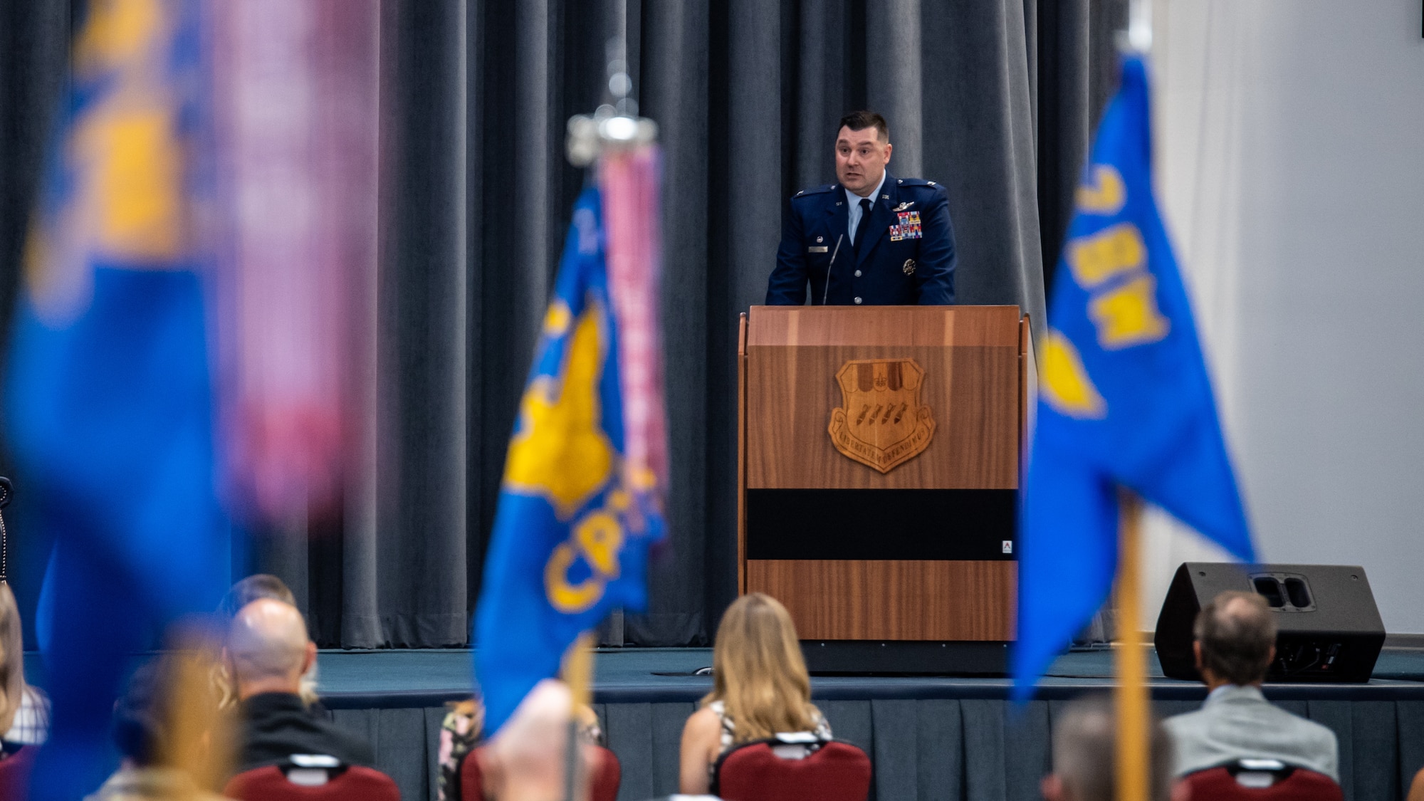 Col. Mark C. Dmytryszyn, incoming 2nd Bomb Wing commander, addresses the crowd during a change of command ceremony at Barksdale Air Force Base, La., July 23, 2020. A change of command is a military tradition that represents a formal transfer of authority and responsibility for a unit from one commanding or flag officer to another. (U.S. Air Force photo by Airman 1st Class Jacob B. Wrightsman)