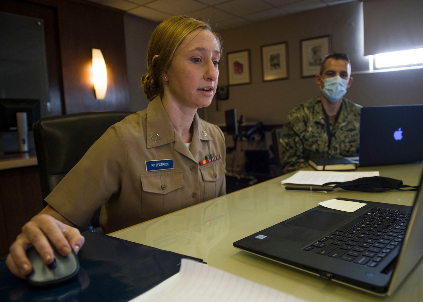 SINGAPORE (July 23, 2020) Lt. Claire Fitzpatrick, JAG assigned to Singapore Area Coordinator, briefs participants on maritime law during Southeast Asia Cooperation and Training (SEACAT) 2020. SEACAT promotes shared commitments to maritime partnerships, security and stability in Southeast Asia. This year, SEACAT takes shape as a virtual maritime domain awareness symposium with representatives from 22 participating nations.