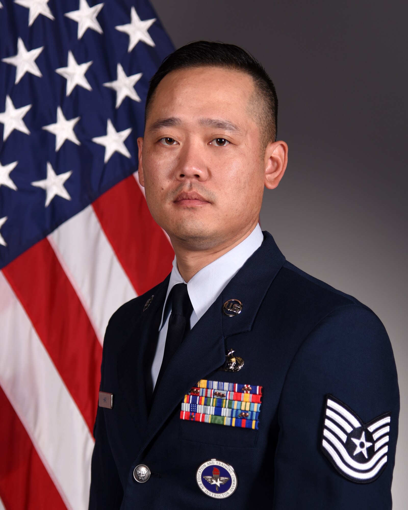 Official portrait of Tech. Sgt. Samuel Han, 316th Training Squadron instructor, taken on Goodfellow Air Force Base, Texas, Jan. 31, 2020. (U.S. Air Force photo by Airman 1st Class Abbey Rieves.)
