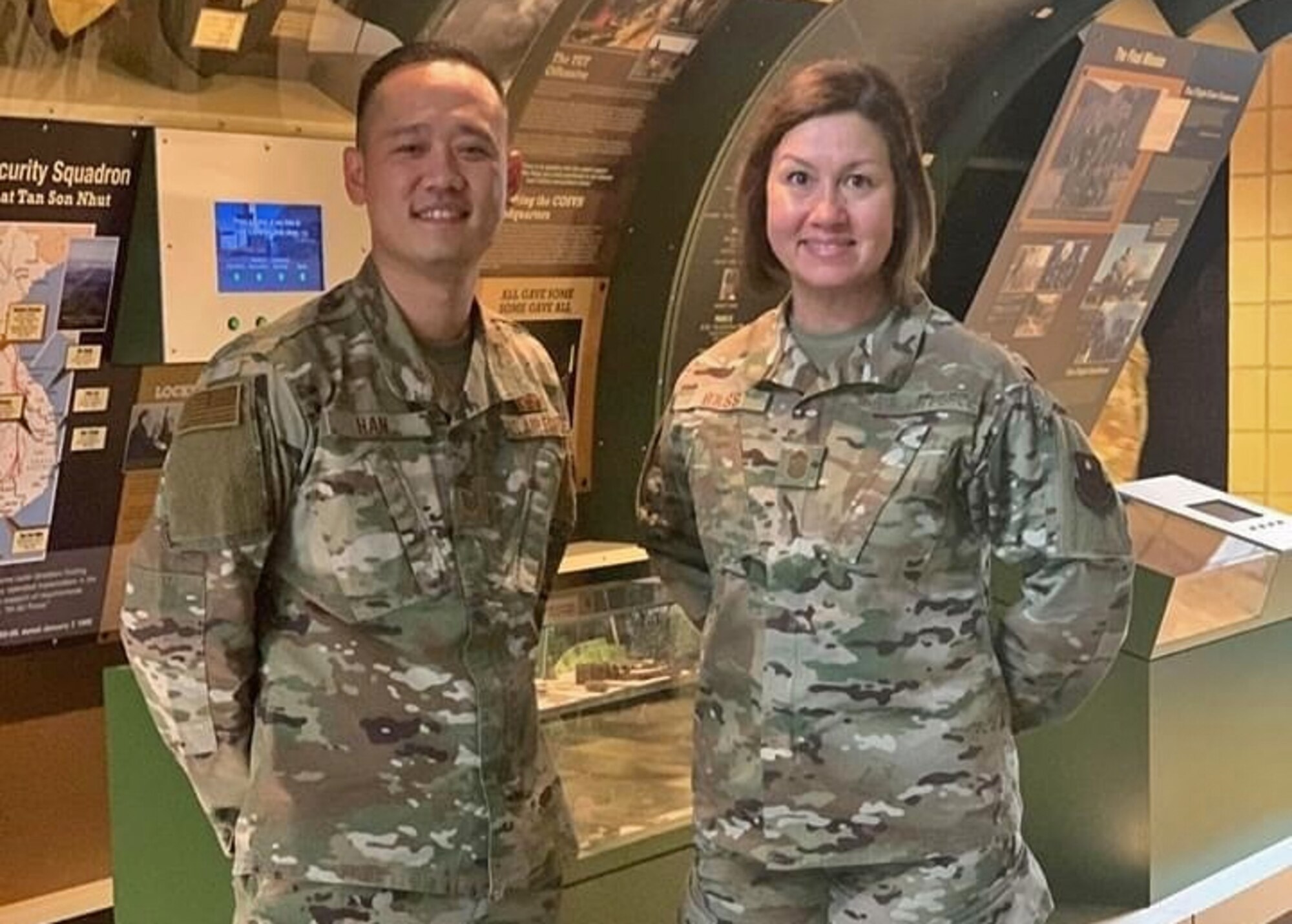 U.S. Air Force Tech. Sgt. Samuel Han, 316th Training Squadron instructor, and Chief Master Sgt. JoAnne S. Bass, Chief Master Sgt. of the Air Force, stand at parade rest in the Norma Brown building, on Goodfellow Air Force Base, Texas, November 20, 2019. Han considers Bass a mentor, they met while Bass was the 2nd Air Force Command Chief. (Courtesy photo)