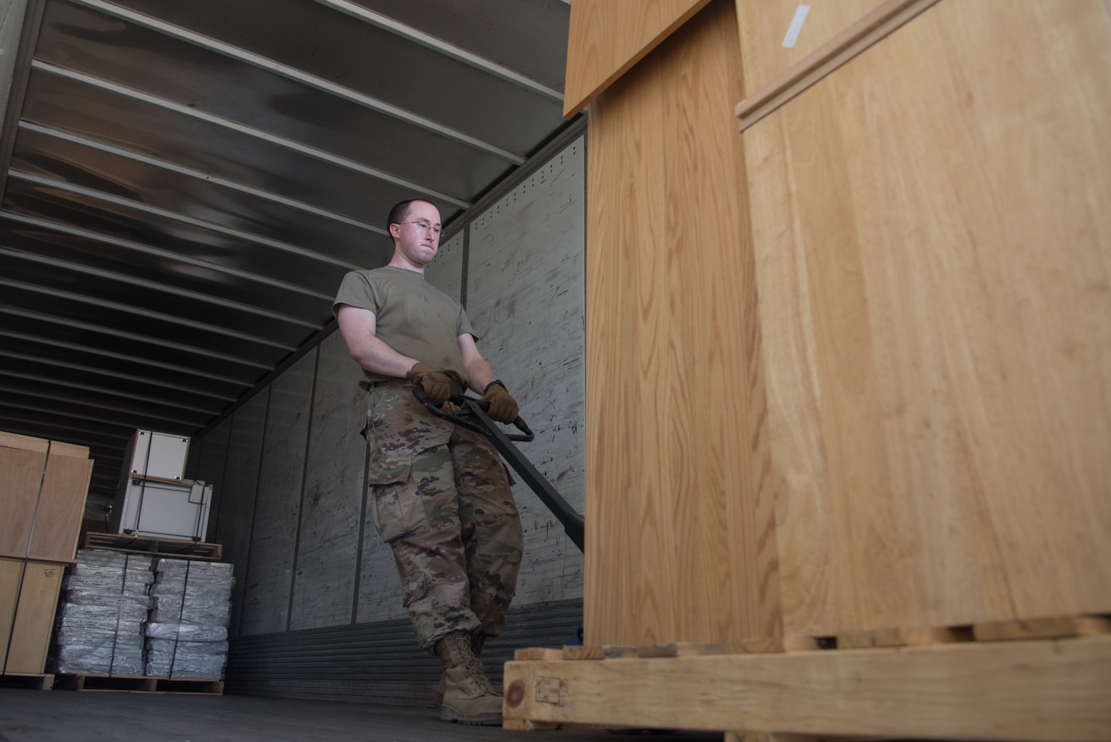 Tech. Sgt. Jeffrey Melton, 22nd Logistics Readiness Squadron flight services center supervisor, loads a pallet of equipment July 22, 2020, at McConnell Air Force Base, Kansas. The Defense Reutilization and Marketing Services provides savings by avoiding Department of Defense procurement and repair costs and is a benefit to the military and other federal agencies.(U.S. Air Force photo by Airman 1st Class Marc A. Garcia)