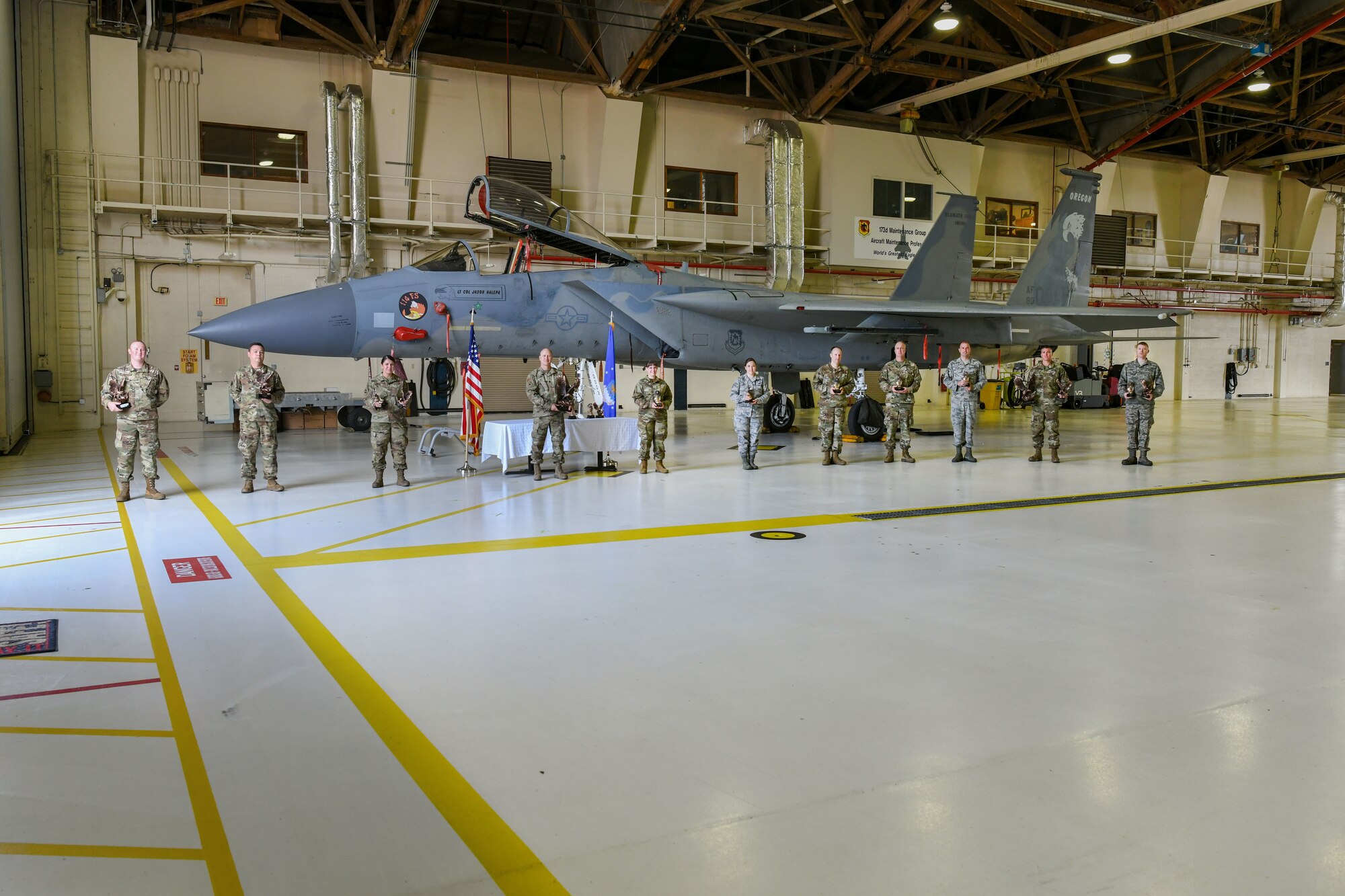 173 MXG Airmen posed by F-15