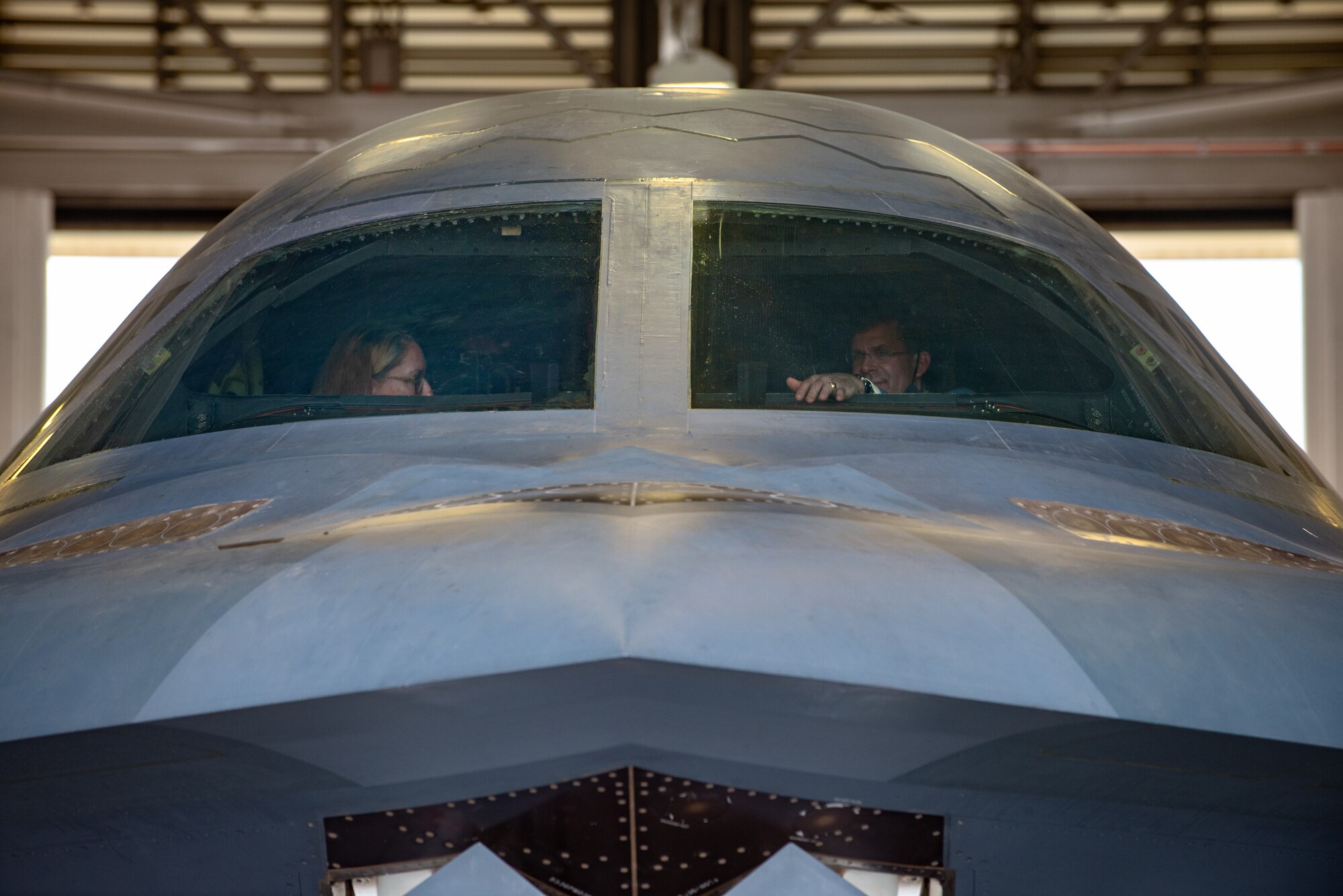 U.S. Secretary of Defense Dr. Mark T. Esper and his wife Leah receive a tour of a B-2 Spirit stealth bomber at Whiteman Air Force Base, Missouri, July 22, 2020. Esper spoke with base leaders and Airmen to receive an in-depth understanding the combat readiness of the Air Force's only B-2 base, including development and employment of the B-2's combat capability as part of Air Force Global Strike Command. (U.S. Air Force photo by Senior Airman Thomas Barley)