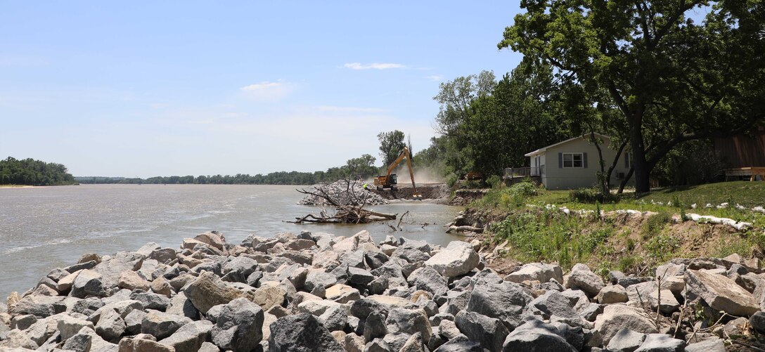 U.S. Army Corps of Engineers, Omaha District employees and contractors repair a scour hole on the Platte River near Thomas Lakes in Marble, Nebraska, June 16. (Photo by Nyime Gilchrist)
