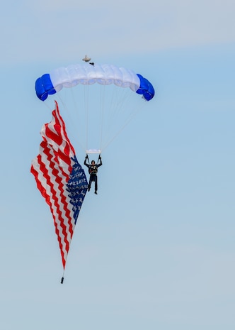 wings of blue parachutist